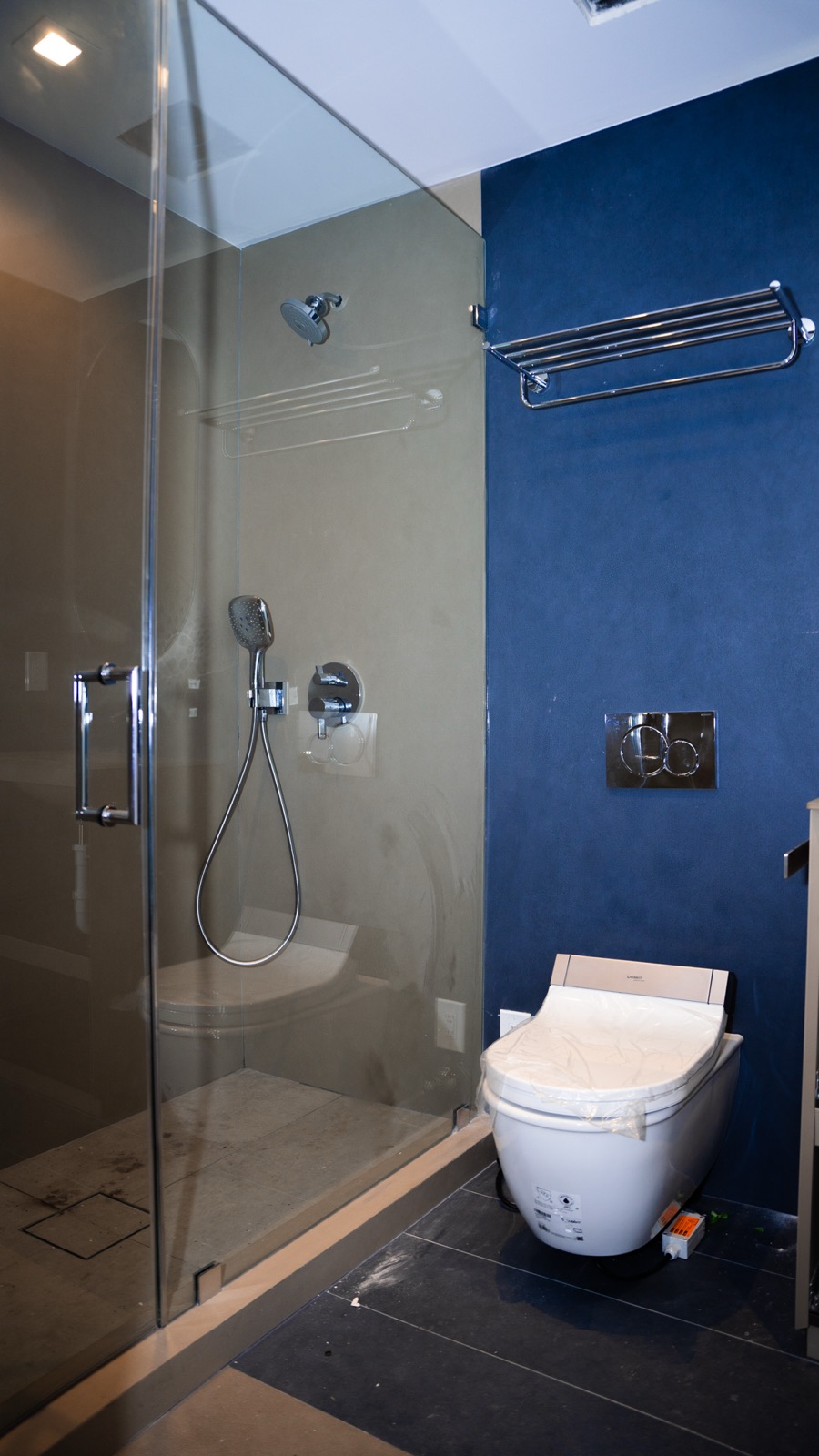 Modern shower with wall-mounted fixtures